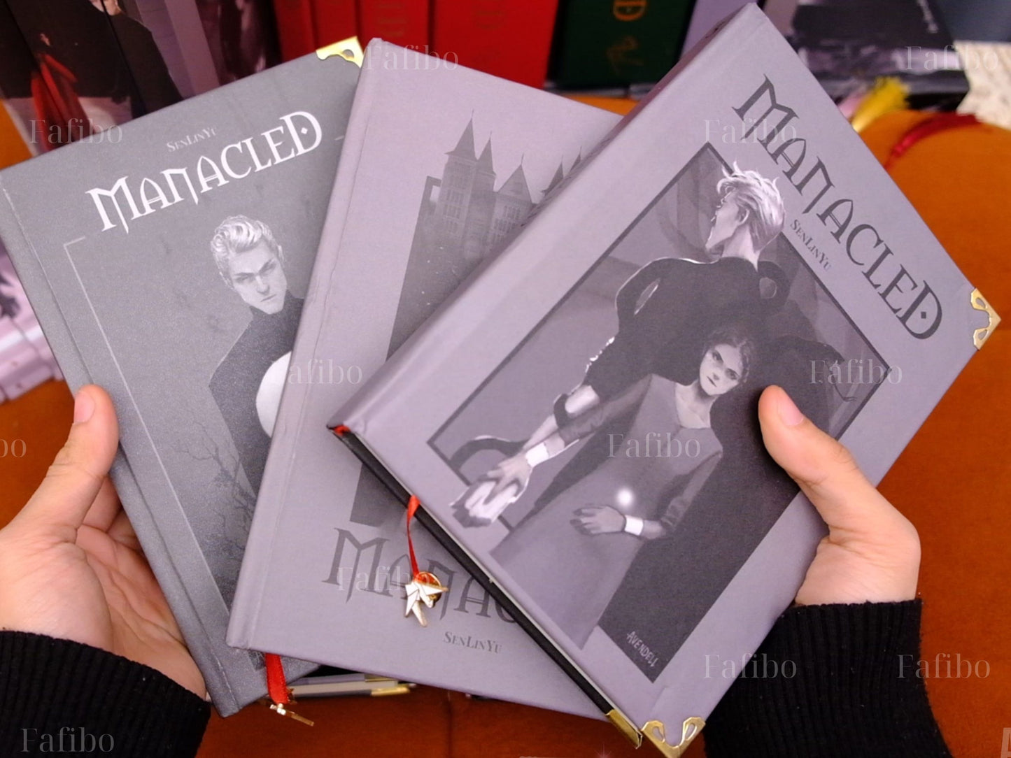 Manacled Book Set – Red Hardcover Binding, Full Series in 3 Volumes with Collector’s Box & Posters